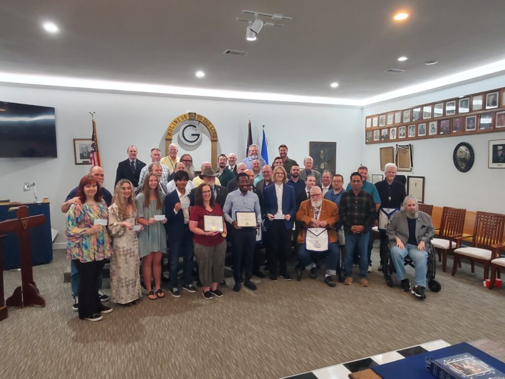 Group picture of award winners and family